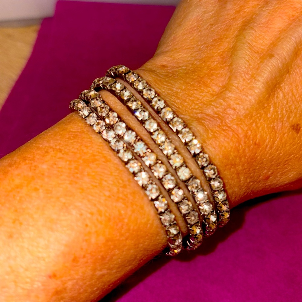 Four vintage stretch, rhinestone bracelets, silver toe